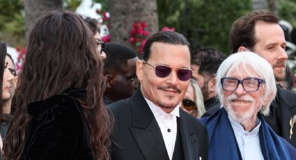 Fanáticos reciben entre gritos a Johnny Depp durante su paso por la alfombra roja de Cannes