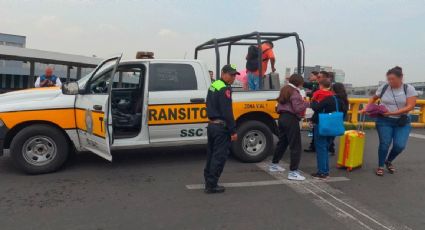 Manifestantes bloquean accesos a la Terminal 1 del AICM; exigen a AMLO solución por el caso Ficrea