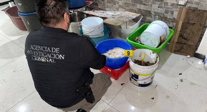 Catean inmueble en Culiacán y aseguran presunta metanfetamina, cartuchos y vehículos