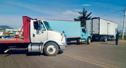 Retienen más de 30 camiones de carga en Michoacán por la desaparición de tres indígenas