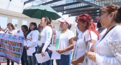 Familias de desaparecidos exigen recursos para el Centro Nacional de Identificación Humana ante la crisis forense