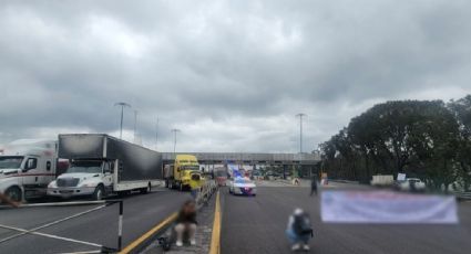 Transportistas bloquean caseta en Puebla y una vía en Quintana Roo para exigir el pago de adeudos por traslado de material para el Tren Maya