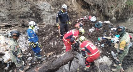 Sube a nueve la cifra de muertos por el deslave en Jilotzingo; rescatan a tres personas con vida