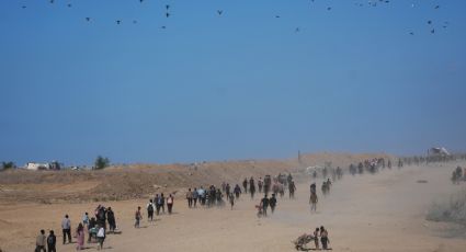 Miles de palestinos regresan a una destruida Franja de Gaza tras alto al fuego