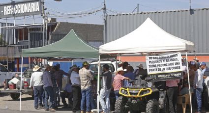 Usuarios carreteros llevan varados más de 12 horas en casetas de Michoacán por bloqueos de agricultores