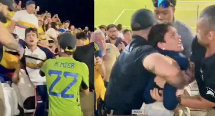 Aficionados colombianos son desalojados con violencia por agentes de seguridad en las tribunas durante un partido amistoso en Miami