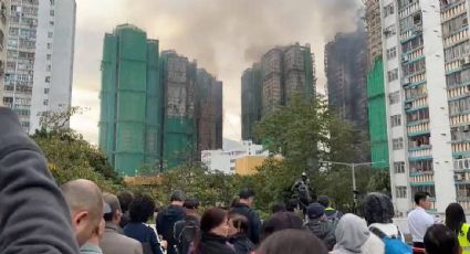 Detienen en Hong Kong a jurista que organizó evento para pedir transparencia sobre incendio que ya suma 156 muertos