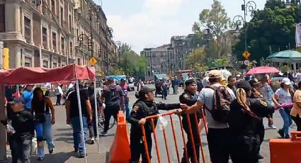 Encapuchados irrumpen en la marcha del Día del Trabajo con enfrentamientos y destrozos