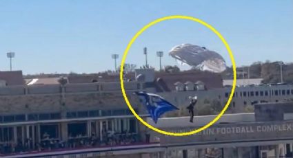 ¡Bajan! Paracaidista se derrumba 11 metros tras enredarse durante show en el Armed Forces Bowl