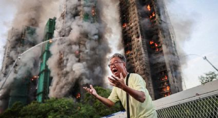 Damnificados vuelven a las ruinas de sus edificios tras el incendio más devastador de Hong Kong