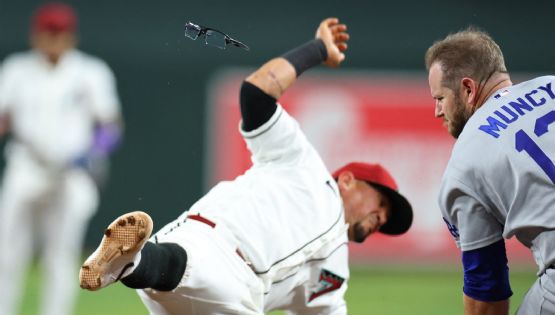 ¡Golpazo! Muncy, de Dodgers, y Vargas, de Diamondbacks, colisionan de manera impactante en la primera base y dejan el juego